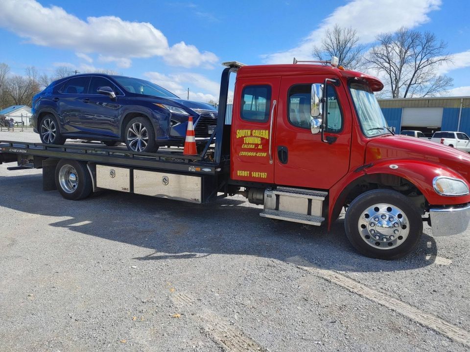 Blue Lexus SUV on the Flatbed