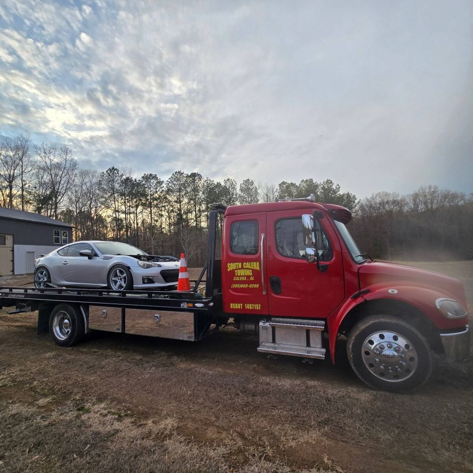 Silver Sports Car Hauled to Pell City