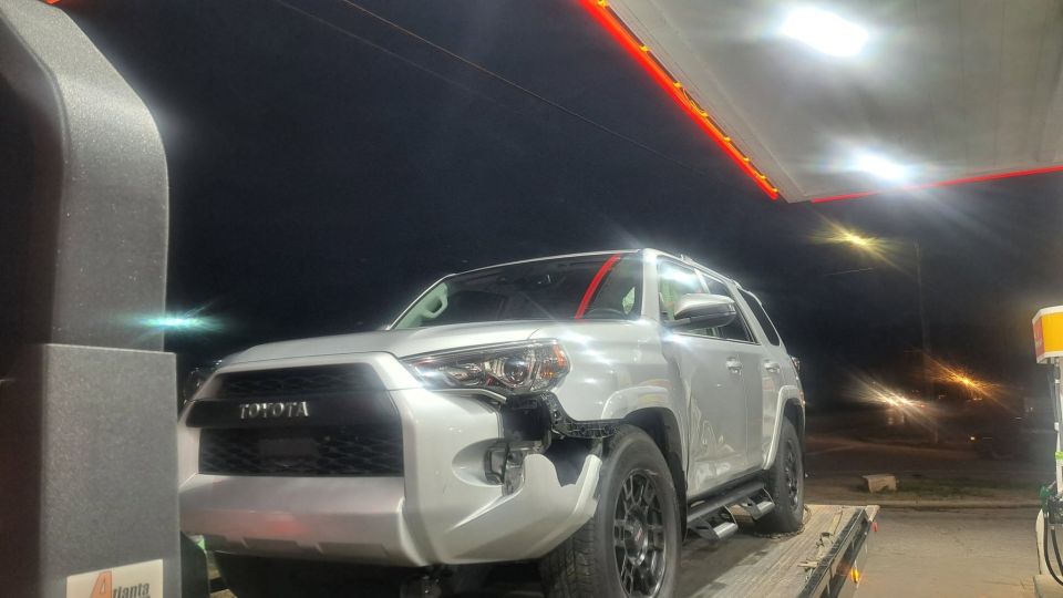 Toyota 4Runner Towed at Night After a Collision