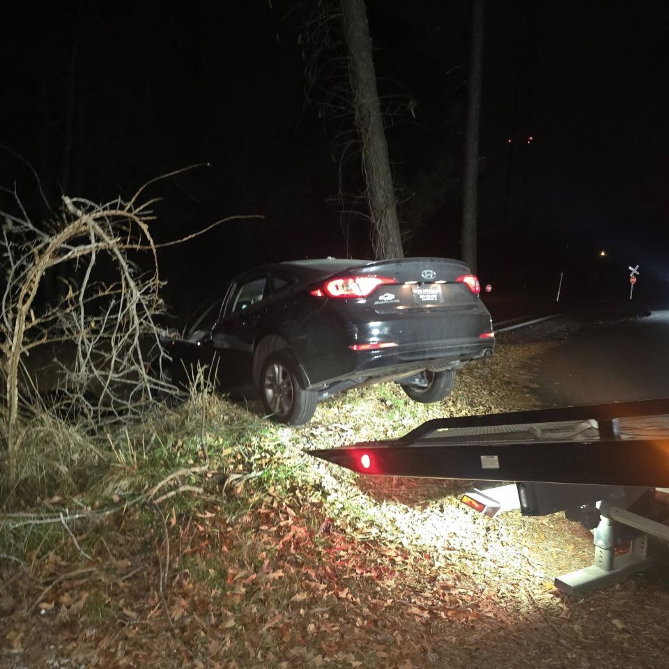 Car Pulled Out of the Brush at Night