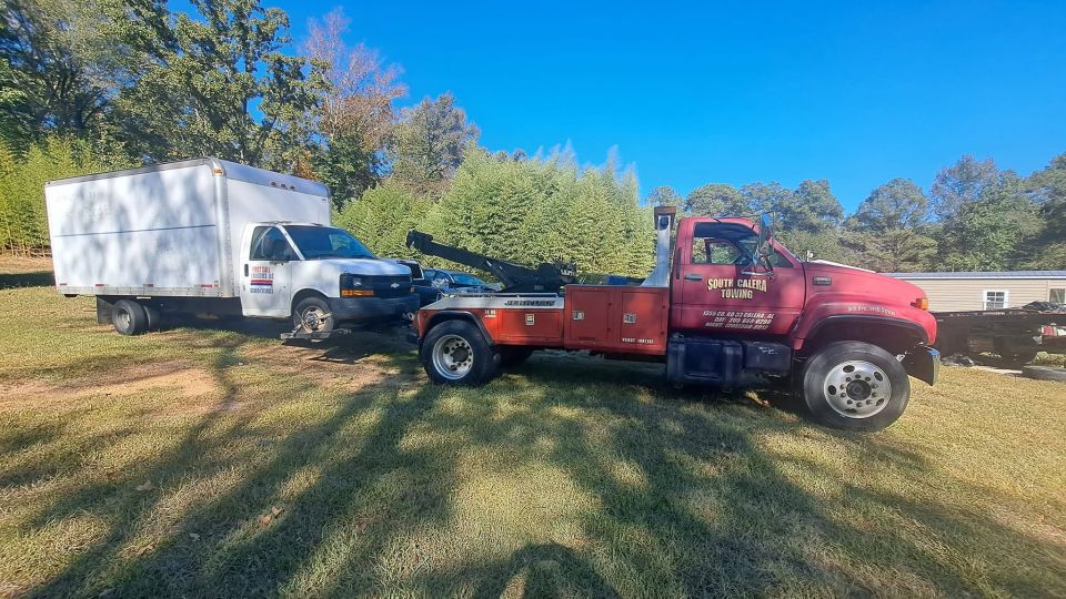 Box Truck Towed With the Wheel-Lift Wrecker