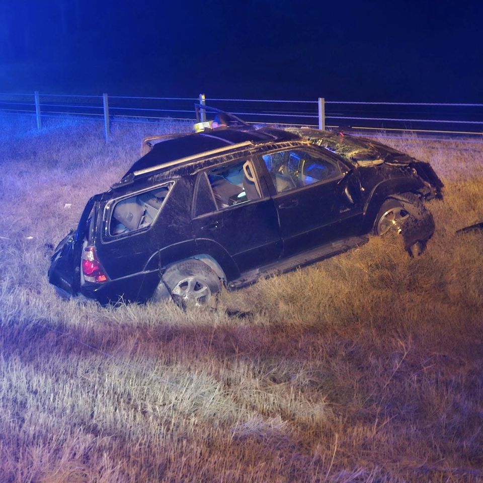 SUV Rolled Into a Field at Night
